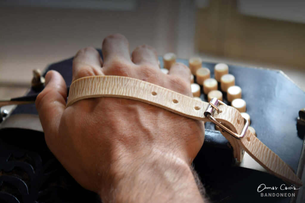 Handmade rawhide leather bandoneon straps.